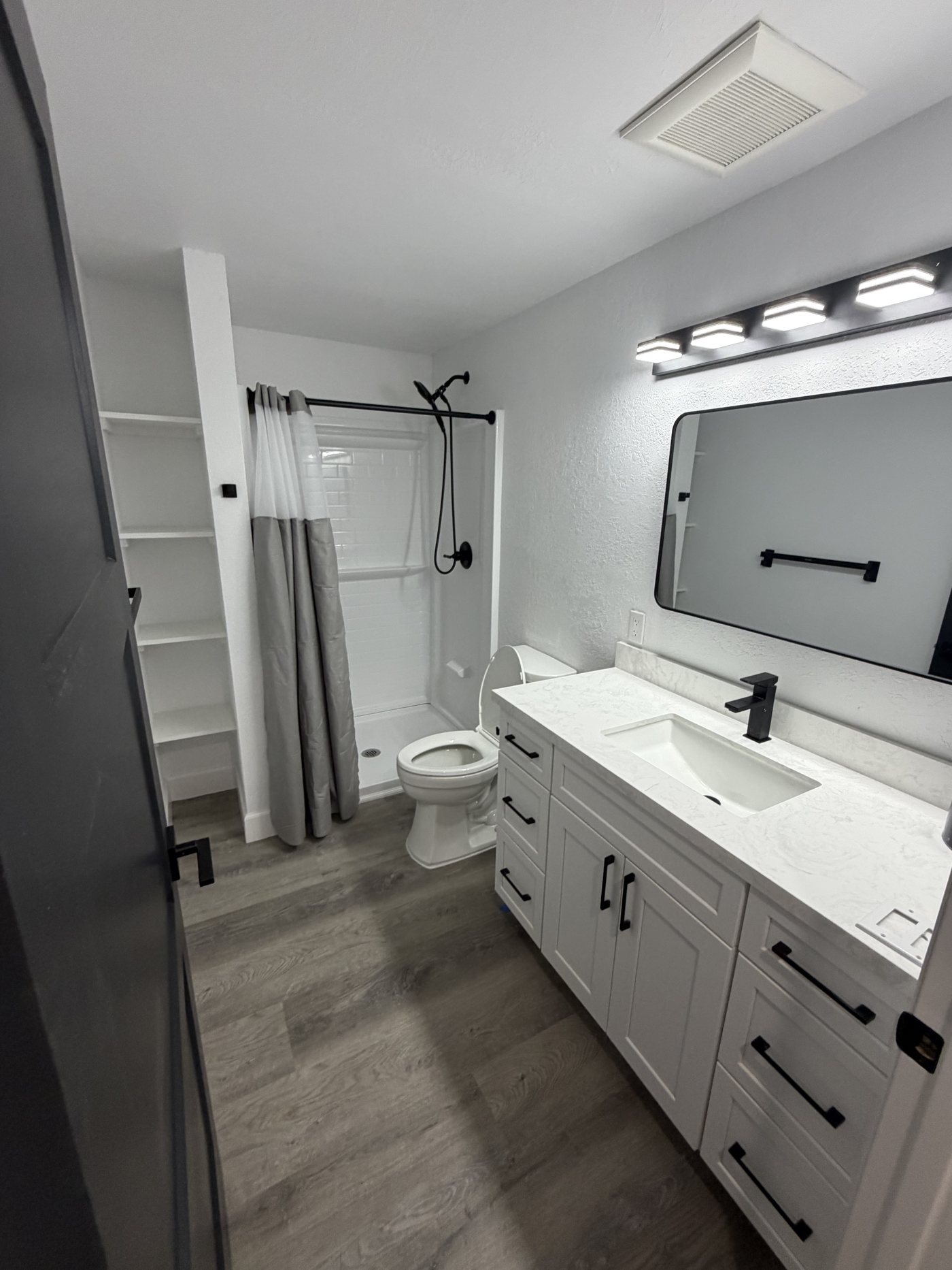 Full bathroom with walk-in shower